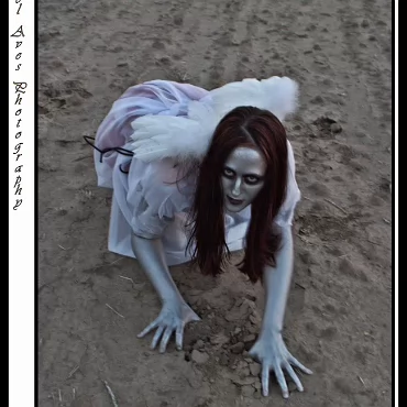 Dark Angel - Monica This was a test shoot we quickly put together. The strange thing was, we where in the middle of no-where, in an un-used field and we where thrown